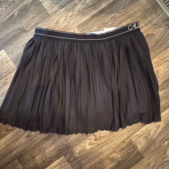 CALIA by Carrie Underwood Dresses & Skirts - CALIA by Carrie Underwood Black Pleated “court” Tennis Skirt with Logo Waistband